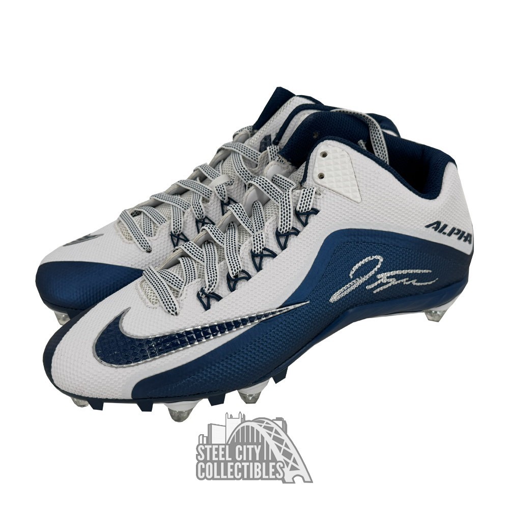 navy blue and white football cleats