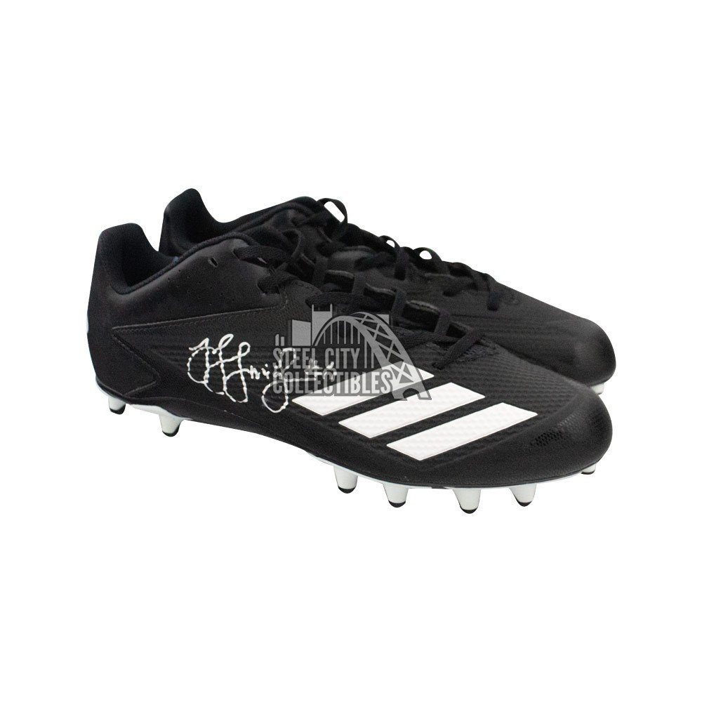 black and white football cleats