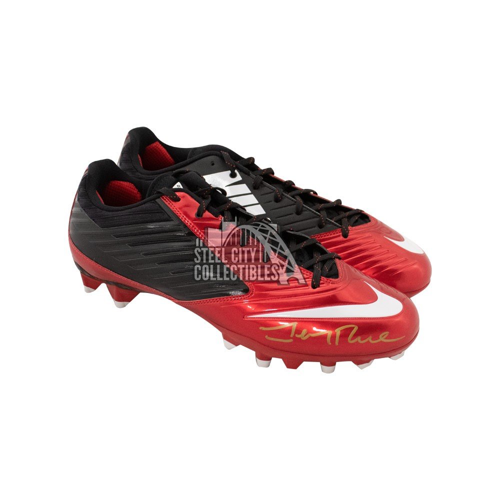 gold and red football cleats
