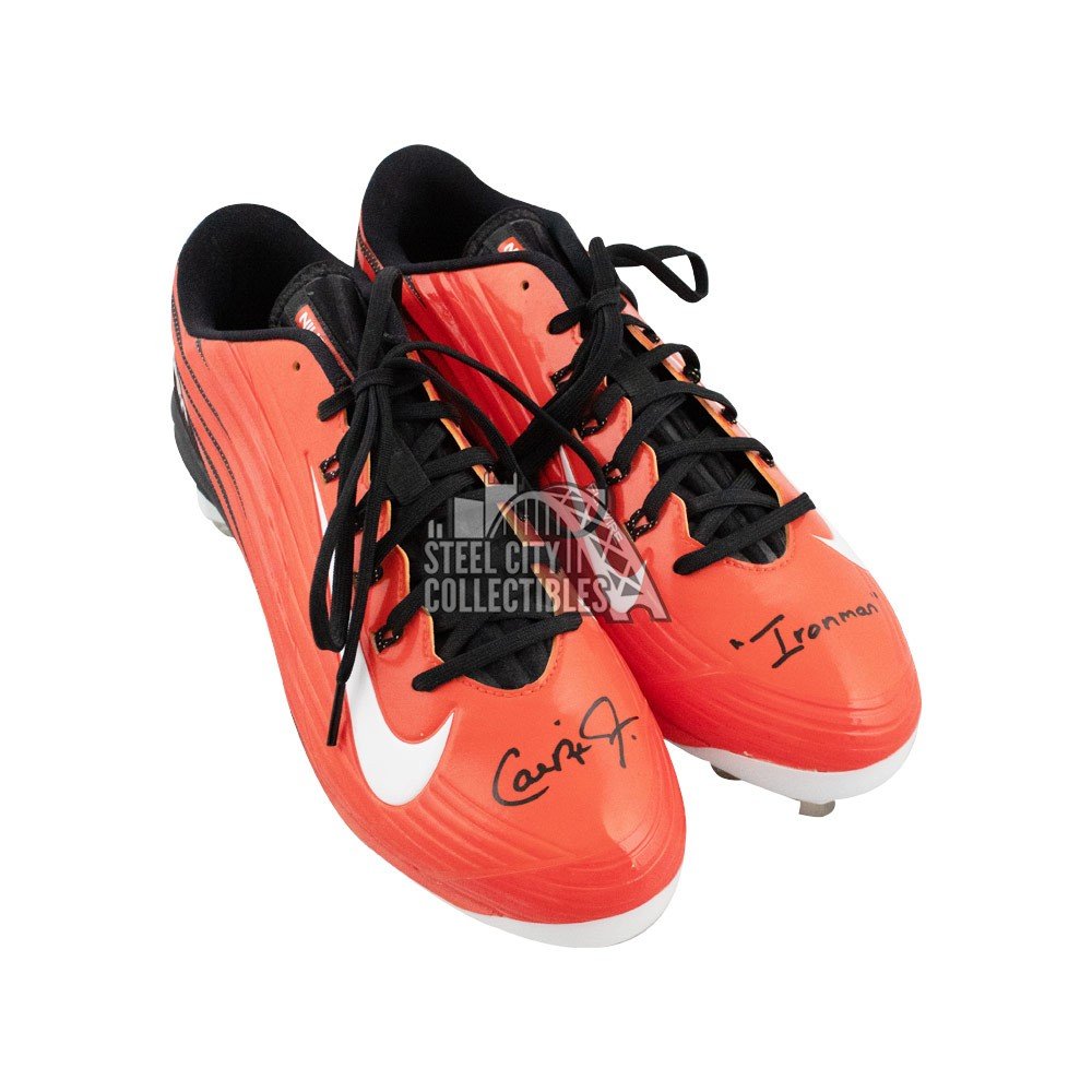 orange baseball cleats