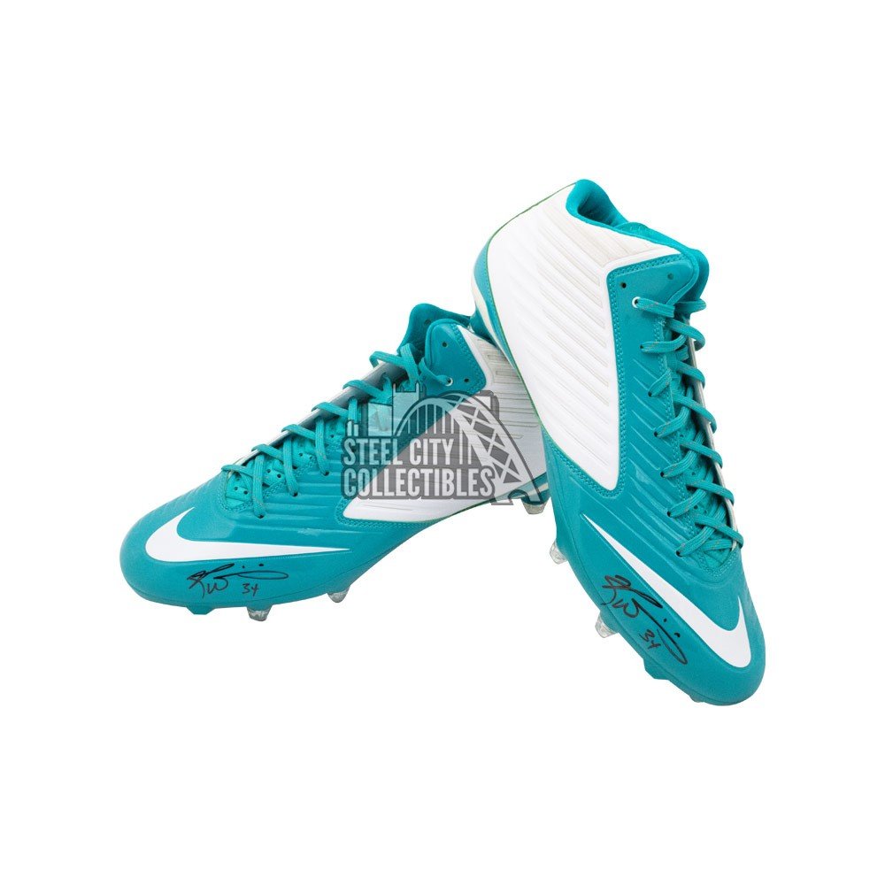 turquoise football cleats