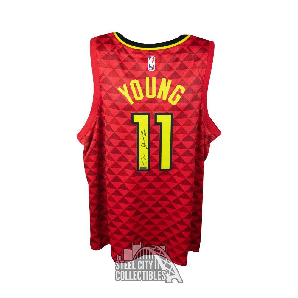 trae young white and gold jersey